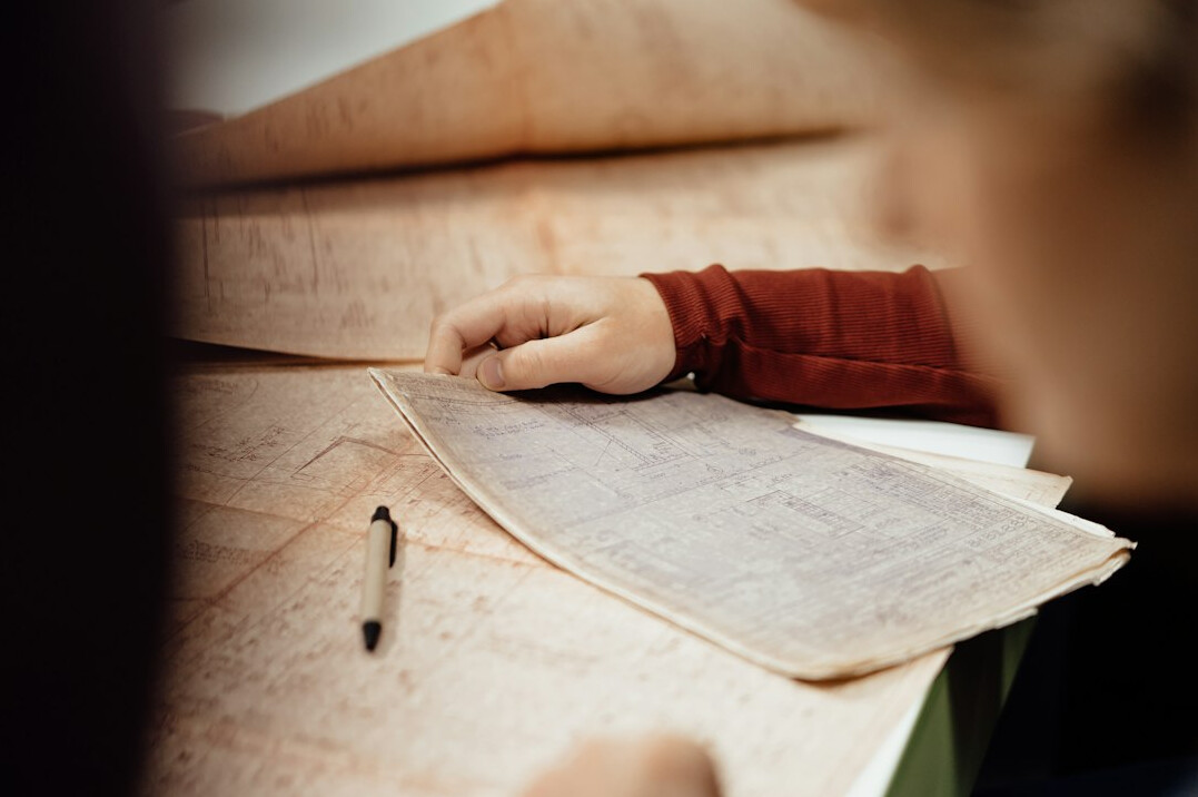 historian examining old papers